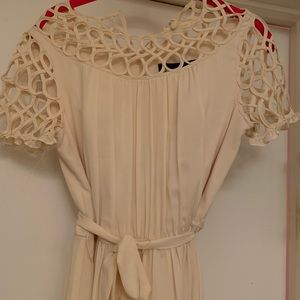 Off white shirt sleeve dress.